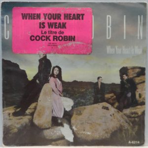 Cock Robin – When Your Heart Is Weak / Because It Keeps On Working 7″ RED CBS