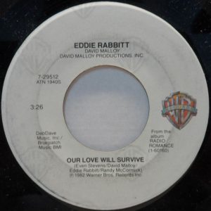 Eddie Rabbitt – Our Love Will Survive / You Put The Beat In My Heart 7″ WB 1982