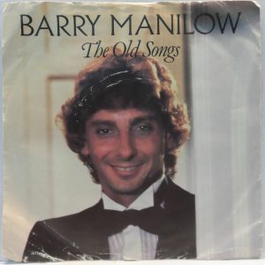Barry Manilow – The Old Songs / It’s Just Another New Year’s Eve 7″ Arista UK