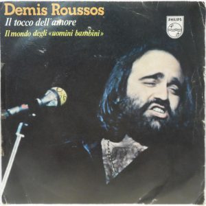 Demis Roussos – Il Tocco Dell’Amore / Il Mondo Degli “Uomini Bambini” 7″ Single